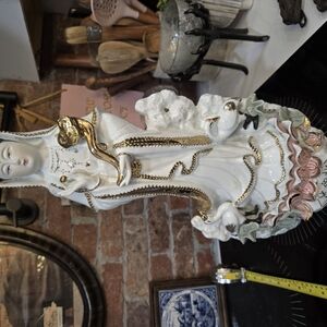Elegant White and Gold Ceramic Statue
